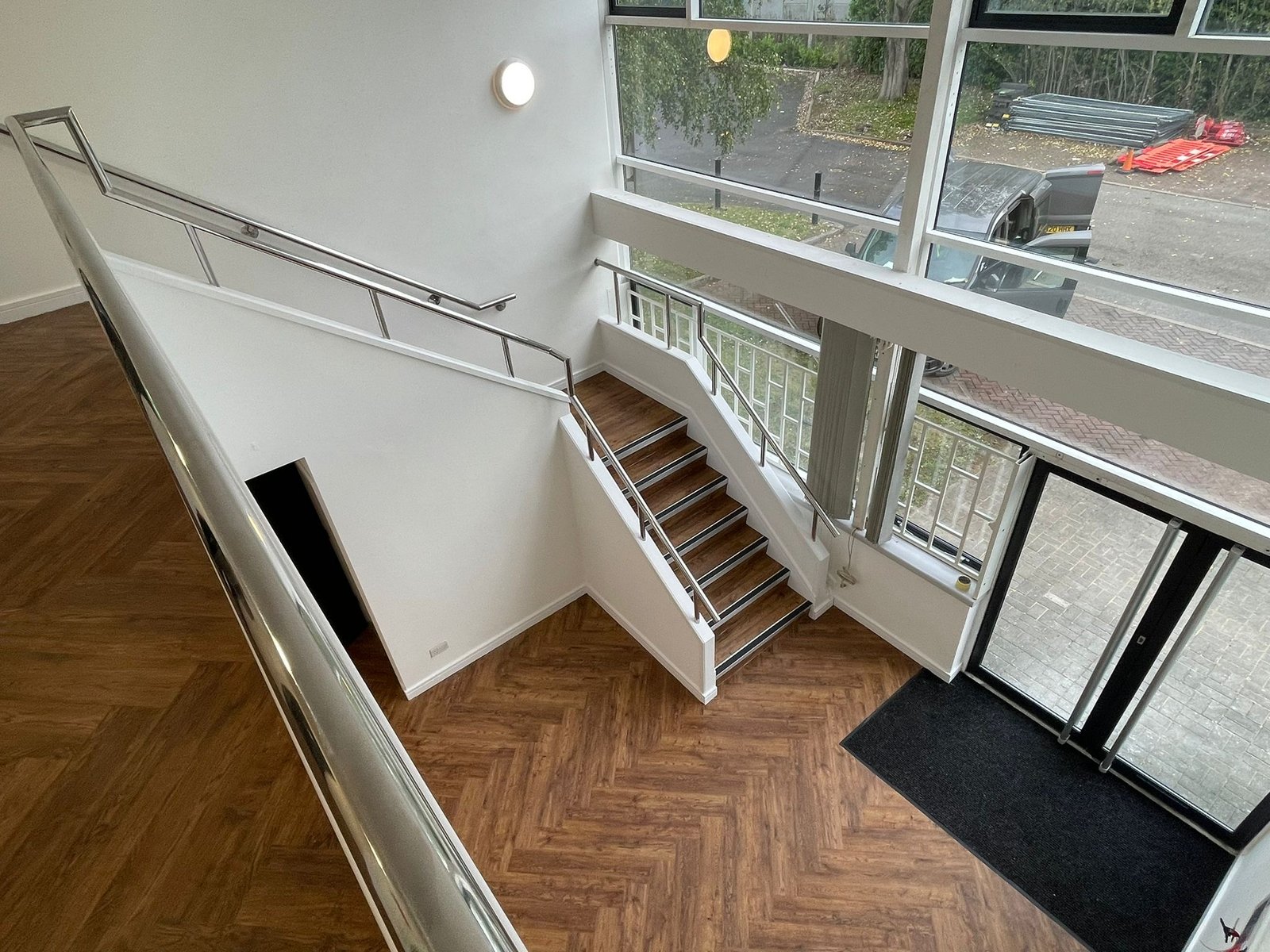 Interior staircase and reception area by Fratton Group PTY LTD