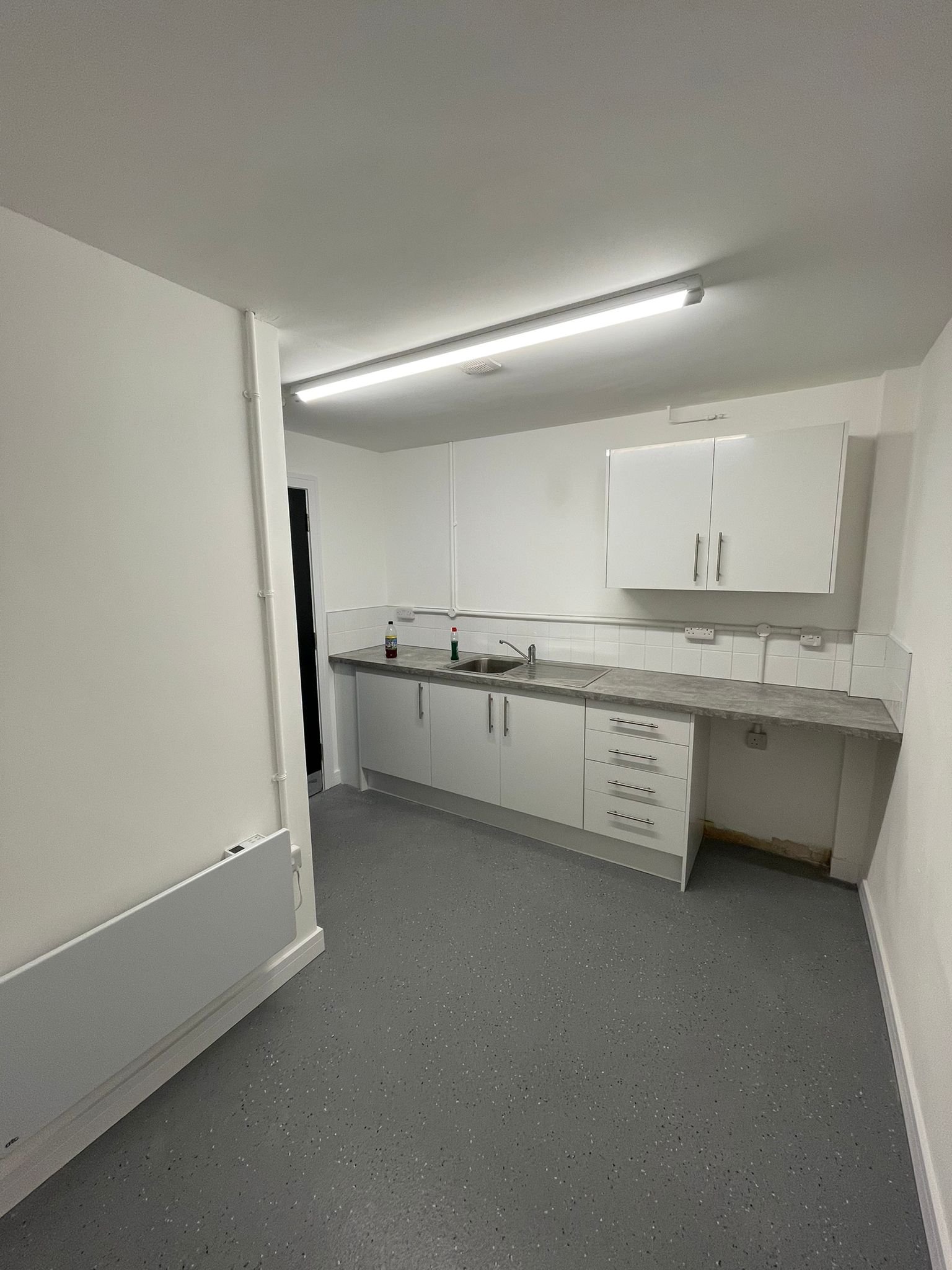 Freshly finished kitchen area by Fratton Group PTY LTD